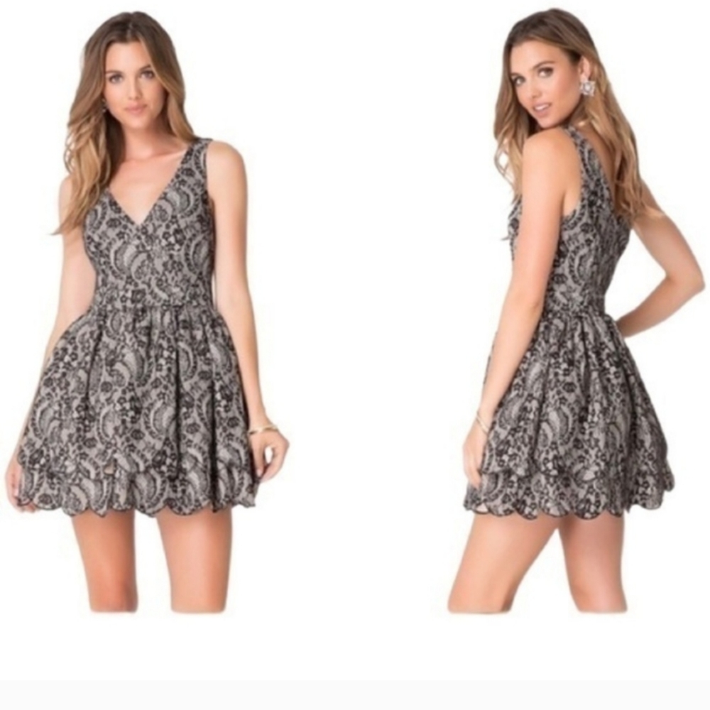 New with tags Bebe double layer lace dress. Size 4